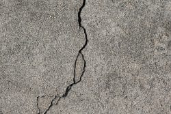 Concrete cracks with loose edges