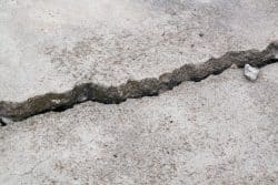 Concrete crack with one side higher than the other side