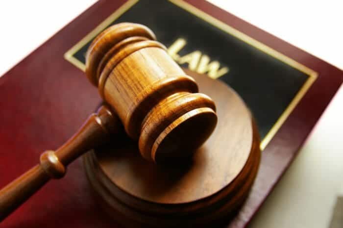 Court Gavel on top of law book