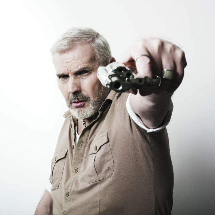 Inspector holding gun
