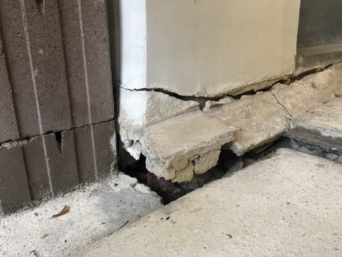 Subsidence causing concrete to sink and crack