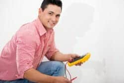 Home Inspector checking for electrical defects