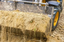 Soil in tractor bucket