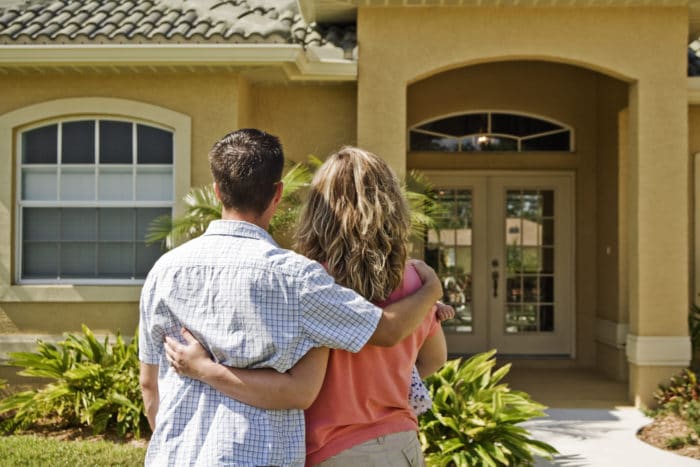 Couple looking at new house