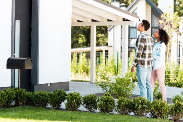 Couple looking at house