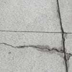 Crack in concrete by control joint