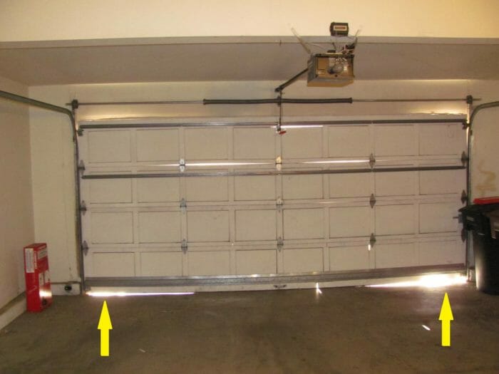 Gaps At Bottom Of Garage Door Indicates, How To Seal Garage Door With Uneven Floor