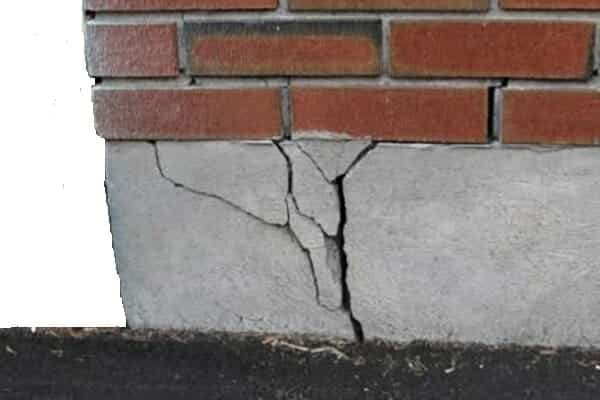 Badly cracked concrete foundation