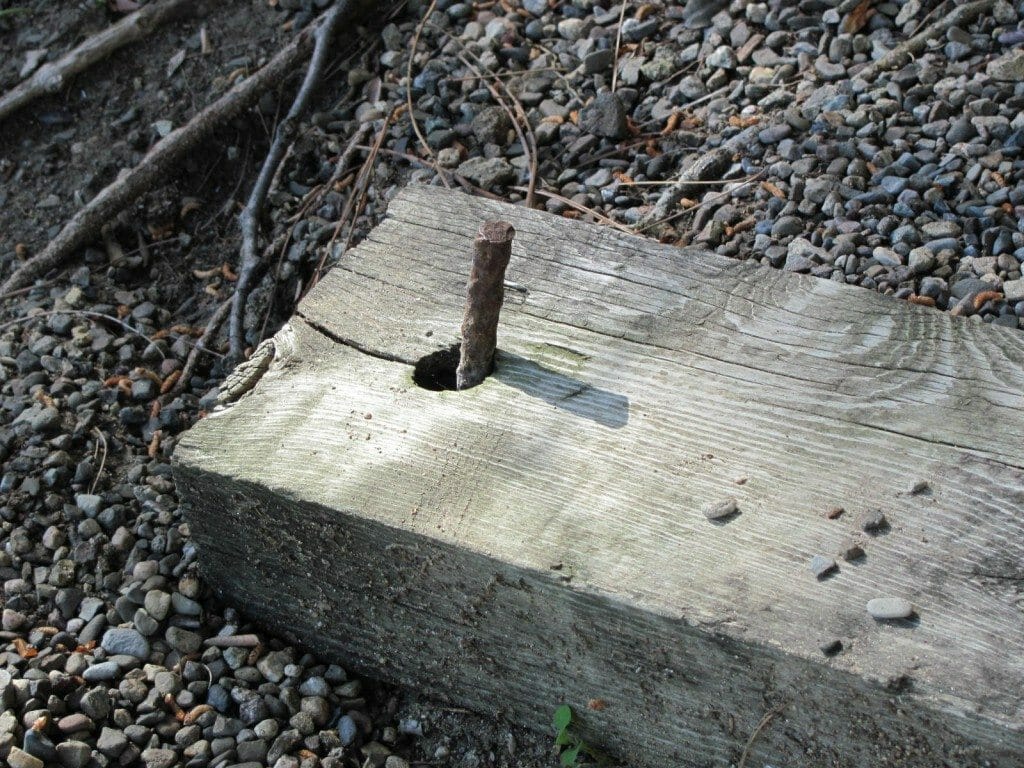 Rebar sticking through wood