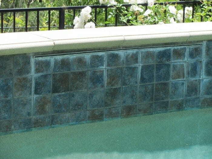 calcium tile pool build mineral cleaning stained ups around occur lack especially maintenance regular pools been which