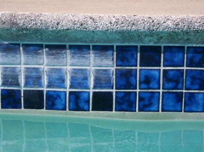 Tile Stained Around The Pool : calcium and mineral build-ups - Buyers Ask