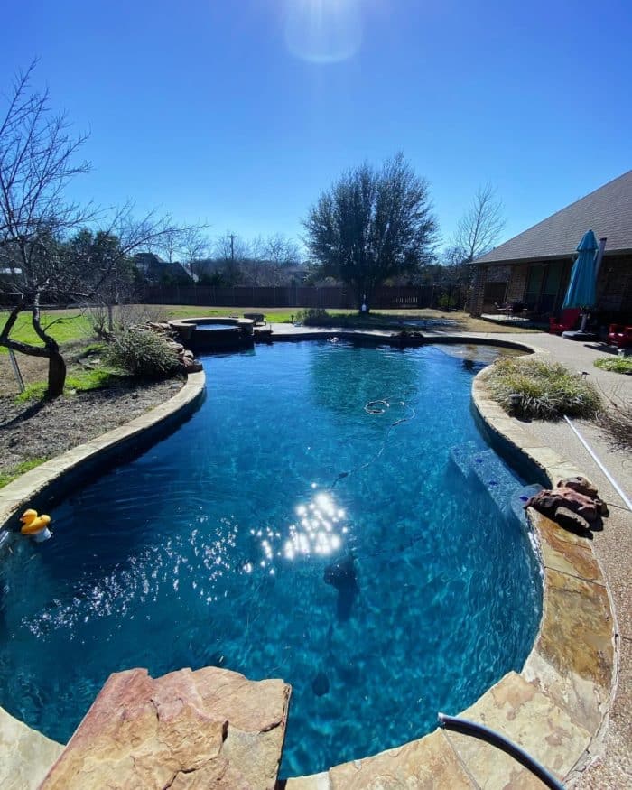 backyard scene with large beautiful pool