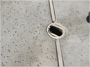 damaged drain cover