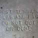 Post Tension Sign Stamped in Garage Floor: What Does It Mean?