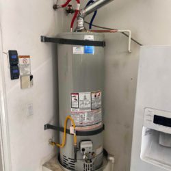 gas water heater with earthquake straps and pan installed