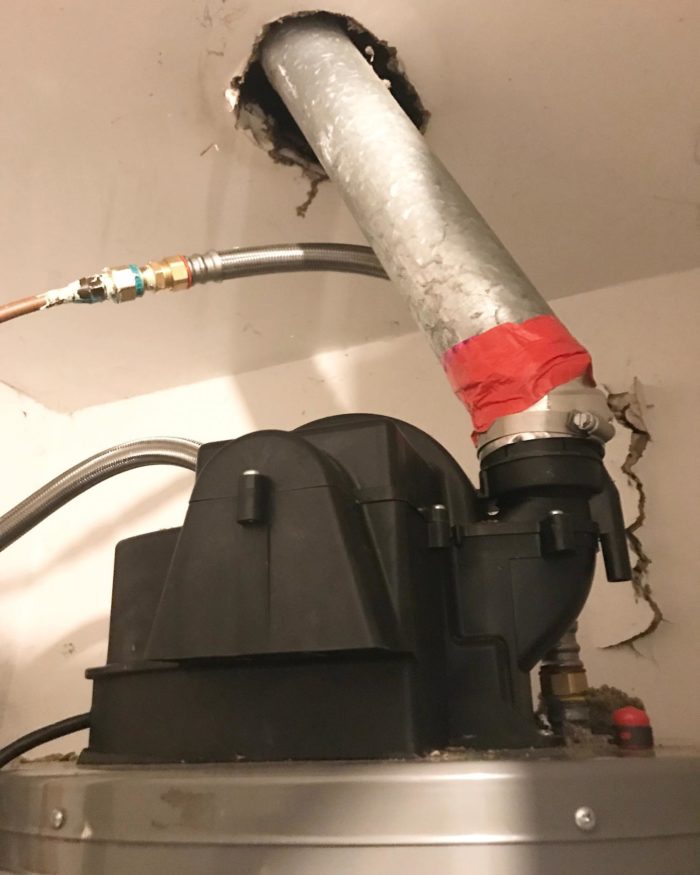 Poorly installed water heater vent pipe